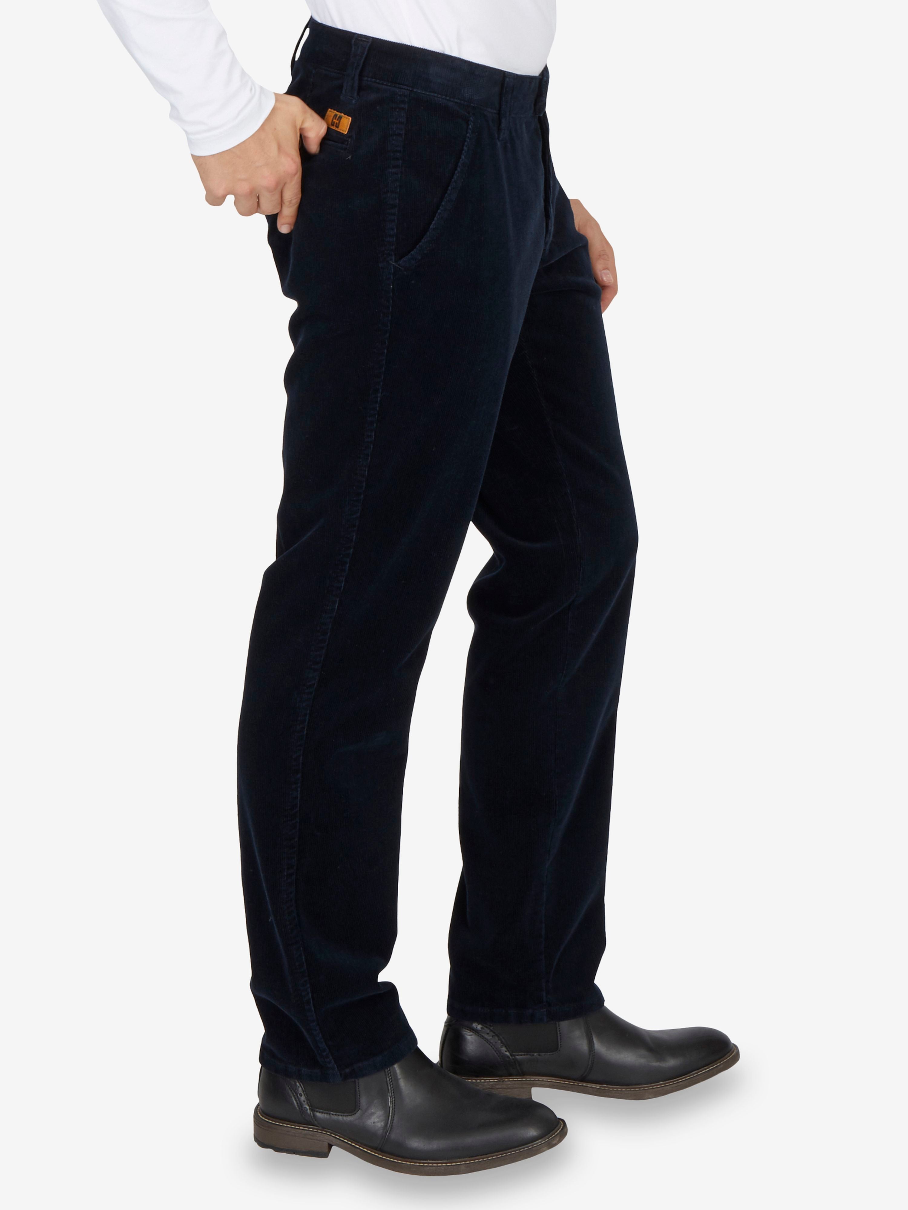 Dunkle Marine-Garvey 8200 Flat Front Hose aus Feincord mit Stretch, elastischem Komfortbund, Hemdenstopper, Bundverlängerung mit Knopf und Haken, Regular Fit, schmaler Beinverlauf, normale Leibhöhe, made in Green by Oeko-Tex, geeignet für Herbst/Winter, präsentiert vor Weißem Hintergrund.